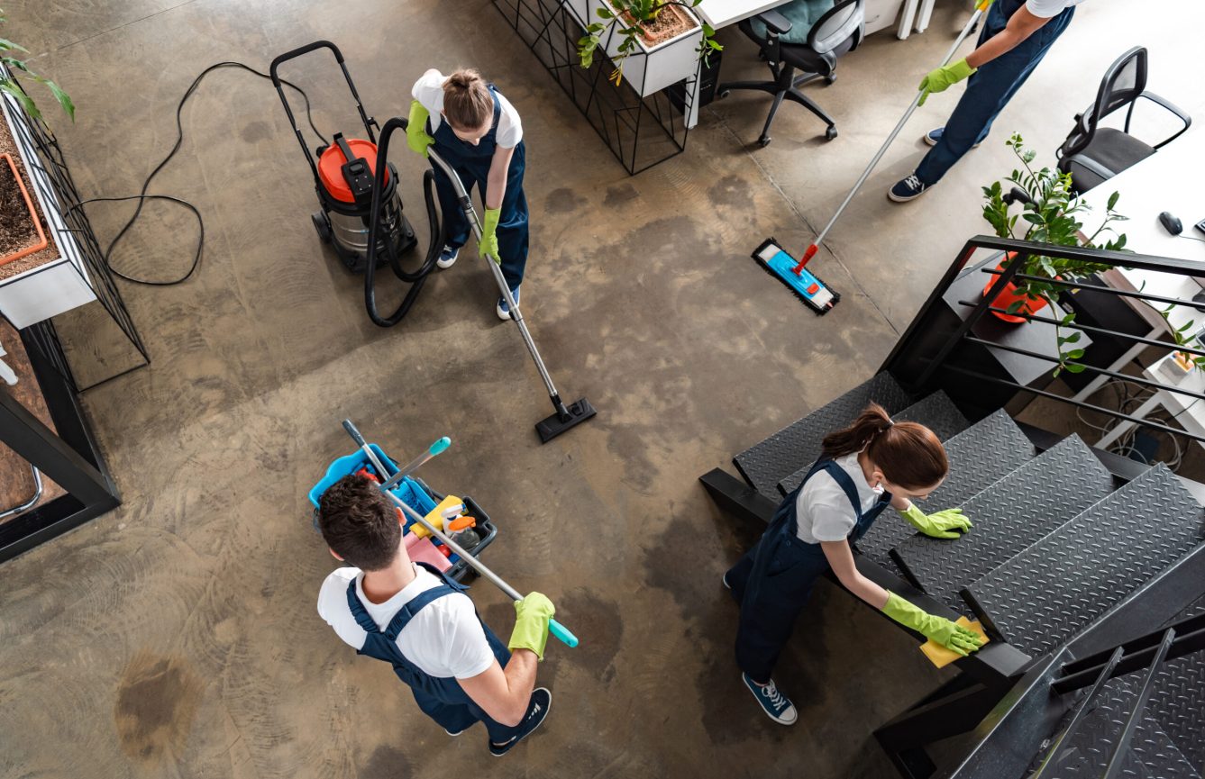 top view of cleaning company team cleaning modern office